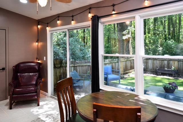 1206 Shiloh Cir NW, Kennesaw, GA 30144 - dining space with light tile patterned floors and ceiling fan