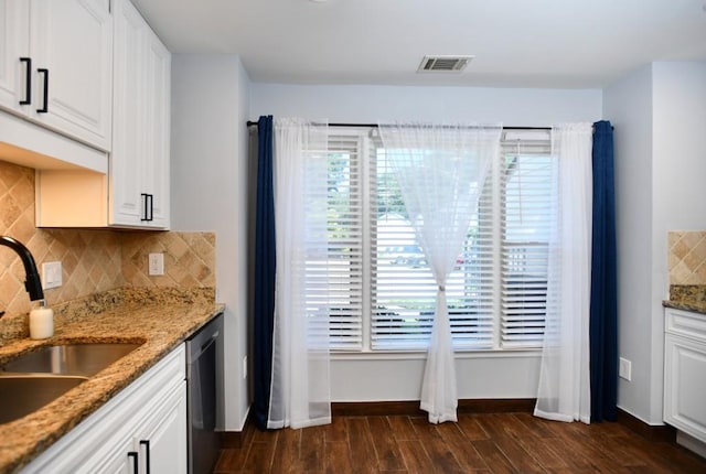 1206 Shiloh Cir NW, Kennesaw, GA 30144 - kitchen featuring dishwasher, dark wood-type flooring, backsplash, and healthy amount of natural light
