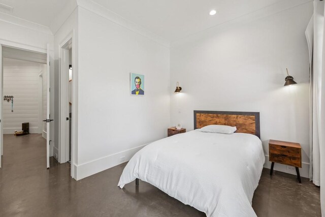 bedroom with crown molding