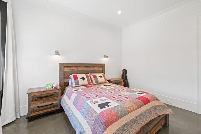 bedroom featuring ornamental molding