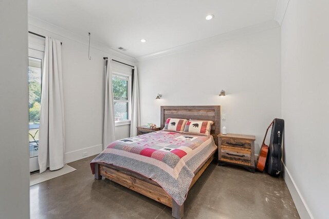 bedroom with ornamental molding