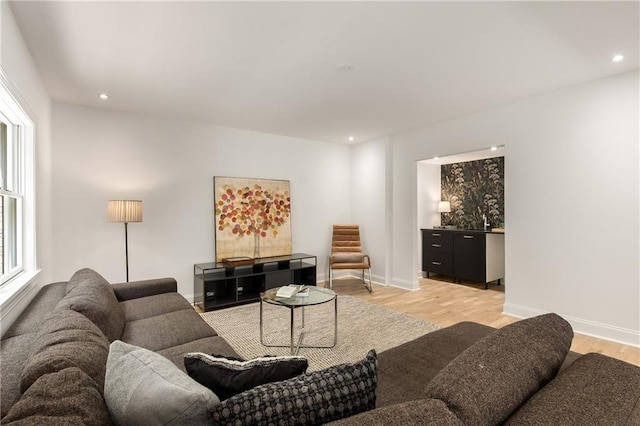 1327 Harvard Rd NE, Atlanta, GA 30306 - living room with light wood-style floors, baseboards, and recessed lighting