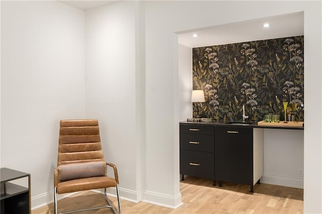 1327 Harvard Rd NE, Atlanta, GA 30306 - living area featuring light wood-type flooring, baseboards, recessed lighting, and bar area
