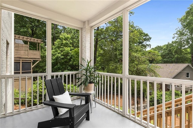 1327 Harvard Rd NE, Atlanta, GA 30306 - sunroom / solarium featuring view of wooded area