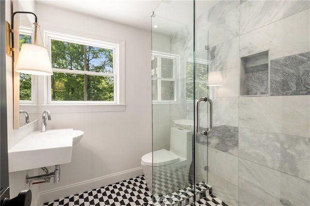 1327 Harvard Rd NE, Atlanta, GA 30306 - bathroom featuring baseboards, a stall shower, toilet, and tile patterned floors