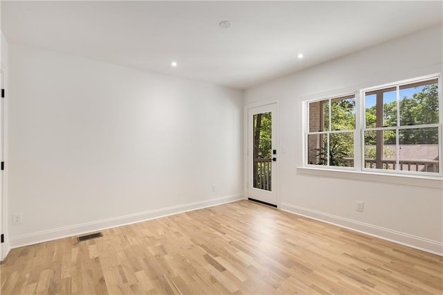 1327 Harvard Rd NE, Atlanta, GA 30306 - unfurnished room featuring light wood-style flooring and recessed lighting