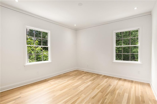 1327 Harvard Rd NE, Atlanta, GA 30306 - spare room featuring baseboards, plenty of natural light, light wood-style flooring, and recessed lighting