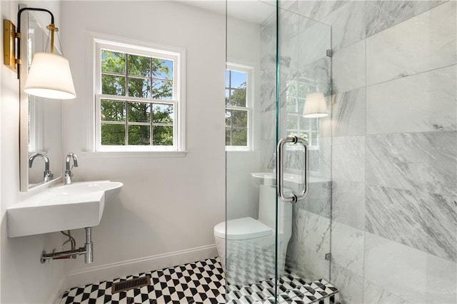 1327 Harvard Rd NE, Atlanta, GA 30306 - full bathroom with a stall shower, baseboards, and toilet