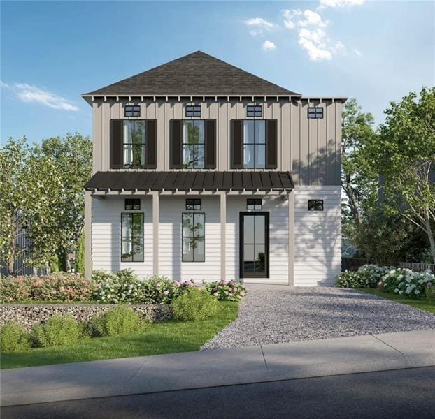 176 Railroad St, Canton, GA 30114 - view of front of property featuring board and batten siding, driveway, a shingled roof, and a standing seam roof