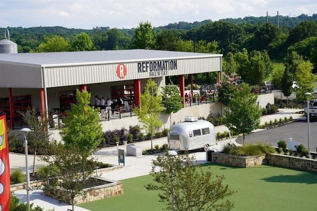176 Railroad St, Canton, GA 30114 - view of building exterior featuring a wooded view