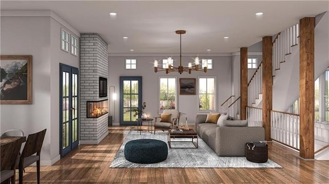 176 Railroad St, Canton, GA 30114 - living room featuring a chandelier, hardwood / wood-style floors, a large fireplace, and recessed lighting