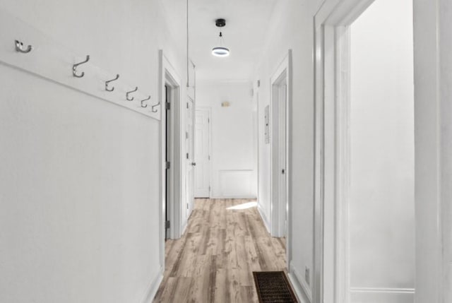 hallway featuring light hardwood / wood-style floors