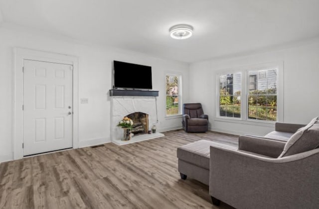 unfurnished living room featuring hardwood / wood-style floors