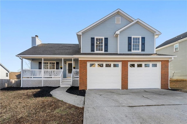 view of front property with a garage and covered porch