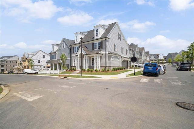 591 Brashy St, Woodstock, GA 30188 - view of asphalt street with a residential view, sidewalks, curbs, and traffic signs