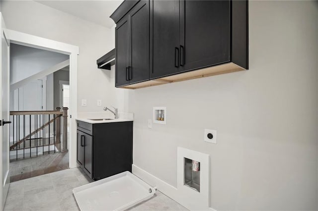 591 Brashy St, Woodstock, GA 30188 - laundry room featuring hookup for an electric dryer, cabinet space, hookup for a gas dryer, hookup for a washing machine, and baseboards