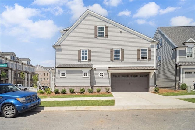 591 Brashy St, Woodstock, GA 30188 - view of front of house featuring brick siding, concrete driveway, a garage, and a standing seam roof