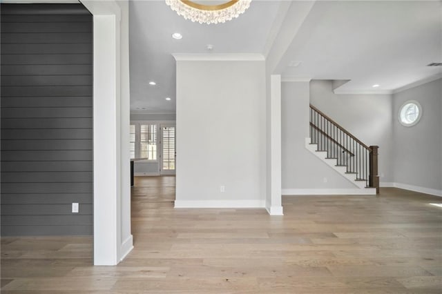 591 Brashy St, Woodstock, GA 30188 - entryway with crown molding, stairs, light wood-style flooring, baseboards, and recessed lighting
