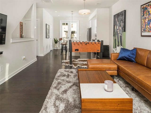 415 Gartrell St SE Unit 16, Atlanta, GA 30312 - living room with dark wood-style flooring and baseboards
