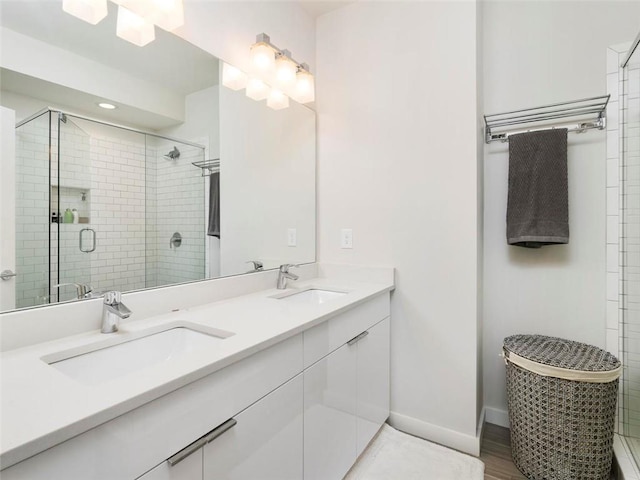 415 Gartrell St SE Unit 16, Atlanta, GA 30312 - bathroom with a stall shower and double vanity