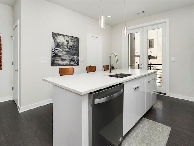 415 Gartrell St SE Unit 16, Atlanta, GA 30312 - kitchen with dishwasher, white cabinetry, dark wood-type flooring, a kitchen island with sink, and recessed lighting