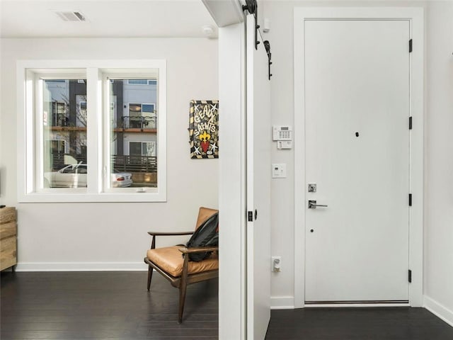 415 Gartrell St SE Unit 16, Atlanta, GA 30312 - entrance foyer featuring dark wood finished floors and a barn door