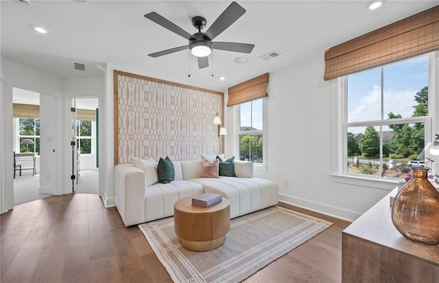 bedroom featuring visible vents, wood finished floors, and recessed lighting