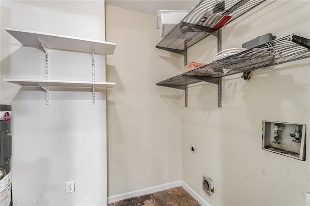 washroom with baseboards, hookup for an electric dryer, laundry area, and hookup for a washing machine