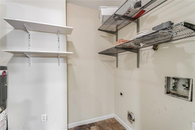 1106 Hampton Way NE, Atlanta, GA 30324 - laundry room with electric dryer hookup, baseboards, hookup for a washing machine, and electric water heater