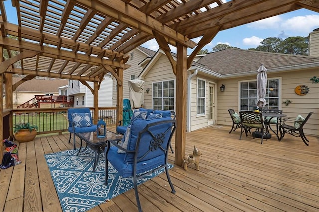 wooden terrace featuring an outdoor hangout area, outdoor dining area, and a pergola