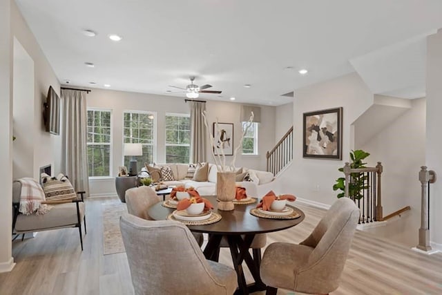 dining area with light wood-type flooring