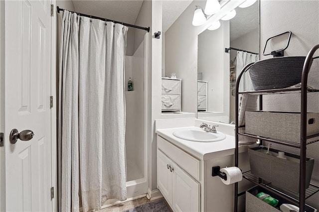 119 Ashley Way, Jefferson, GA 30549 - full bath with vanity, a shower with shower curtain, and a textured ceiling