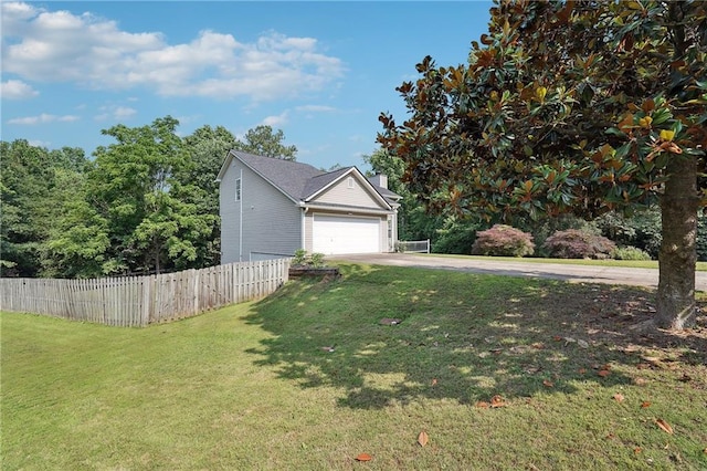 119 Ashley Way, Jefferson, GA 30549 - view of property exterior with concrete driveway, an attached garage, and a chimney