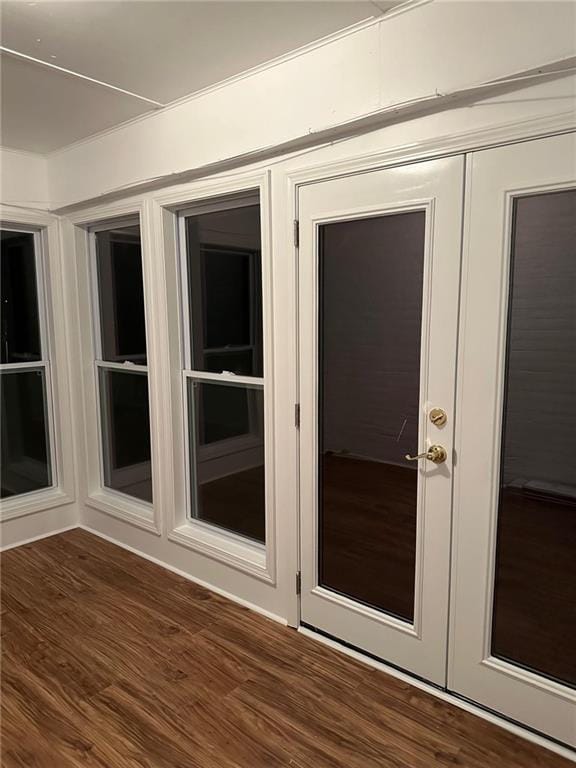 interior space featuring french doors and dark hardwood / wood-style floors