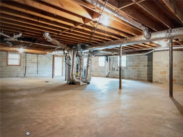 basement featuring heating unit