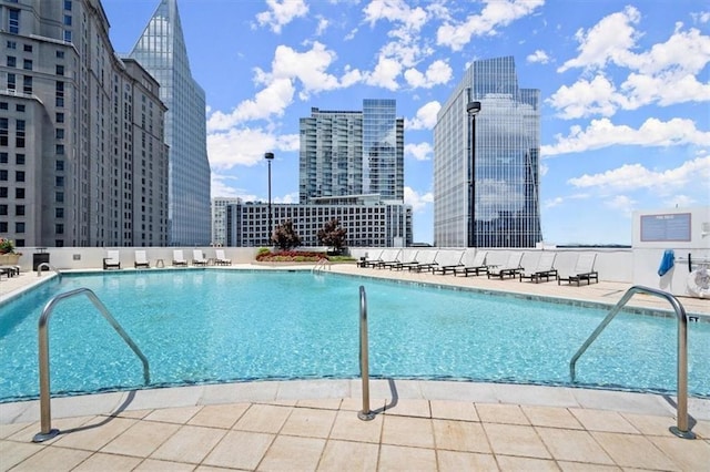 community pool featuring a view of city