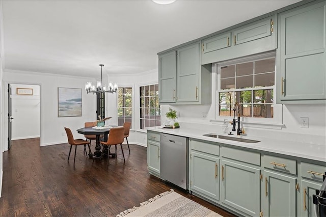 kitchen featuring sink, dark wood-type flooring, stainless steel dishwasher, crown molding, and pendant lighting