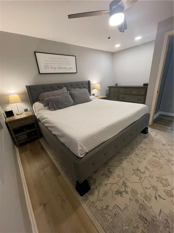433 Spring Place Reseca Rd, Resaca, GA 30735 - bedroom featuring light wood-style flooring, ceiling fan, and recessed lighting