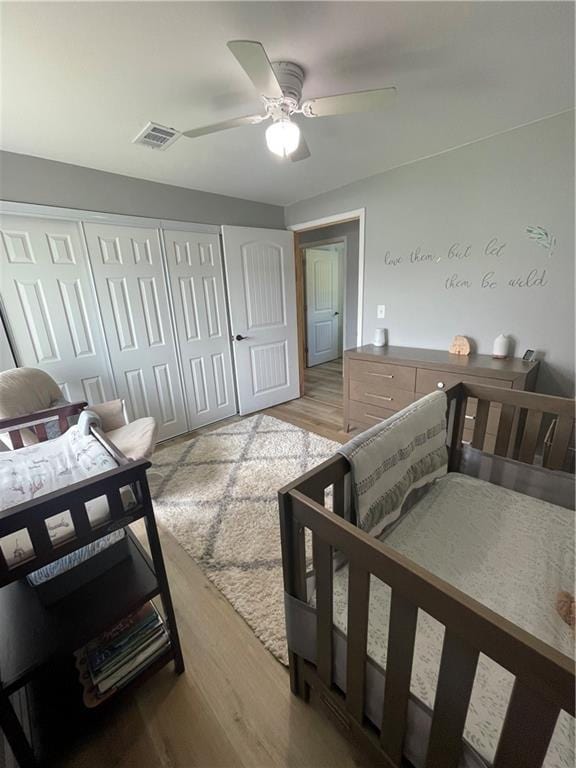 433 Spring Place Reseca Rd, Resaca, GA 30735 - bedroom featuring light wood finished floors, a closet, and a ceiling fan