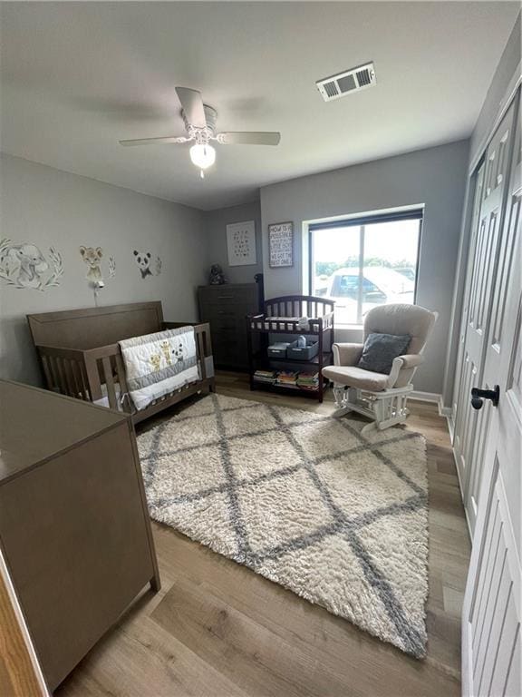 433 Spring Place Reseca Rd, Resaca, GA 30735 - bedroom featuring wood finished floors, a closet, and ceiling fan