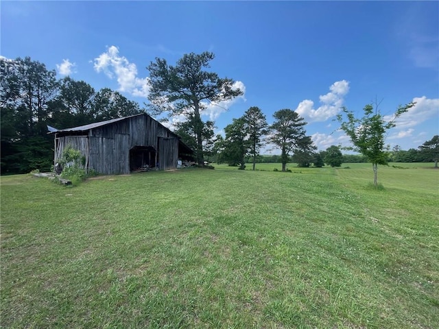 433 Spring Place Reseca Rd, Resaca, GA 30735 - view of green lawn featuring an outdoor structure