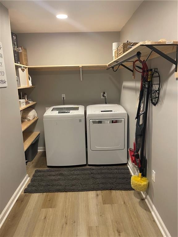 433 Spring Place Reseca Rd, Resaca, GA 30735 - washroom with wood finished floors, separate washer and dryer, baseboards, and recessed lighting