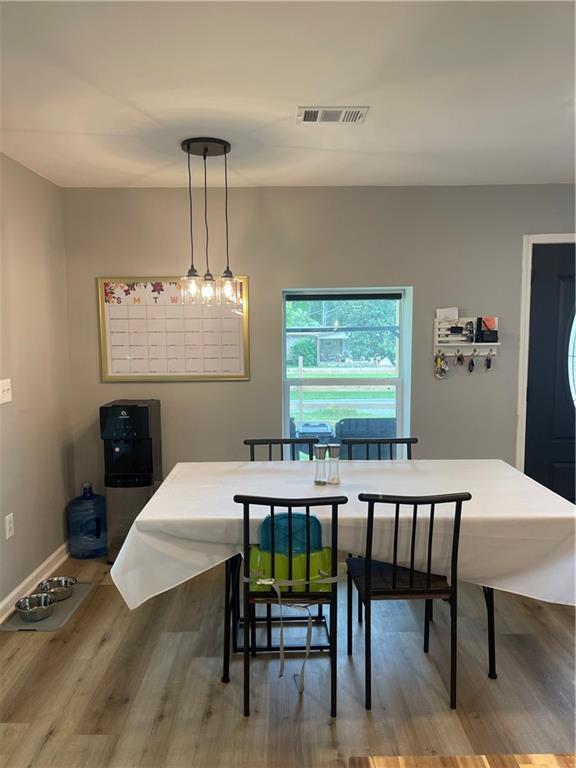433 Spring Place Reseca Rd, Resaca, GA 30735 - dining space featuring wood finished floors and baseboards