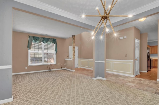 unfurnished room featuring a decorative wall, light colored carpet, baseboards, and ornamental molding