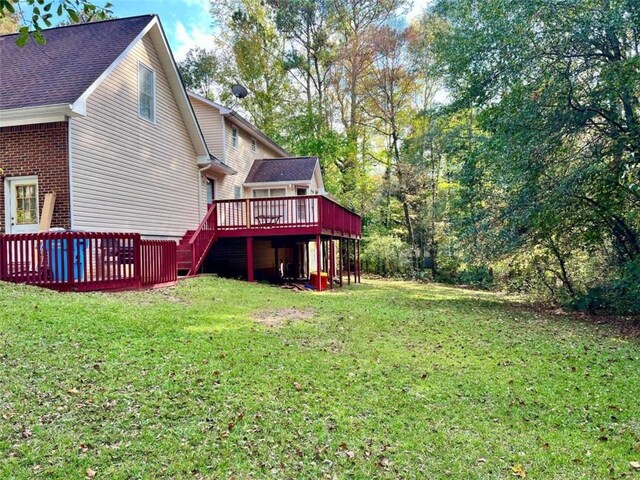 view of yard with a deck