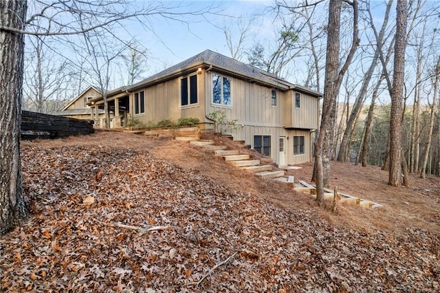 view of property exterior with stairway