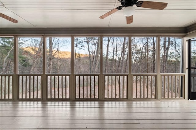 unfurnished sunroom featuring a healthy amount of sunlight