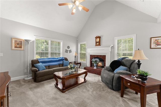 27 Kendall Creek Dr, Jefferson, GA 30549 - carpeted living area with ceiling fan, high vaulted ceiling, a fireplace, and plenty of natural light
