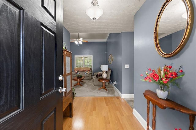 27 Kendall Creek Dr, Jefferson, GA 30549 - foyer featuring light wood-type flooring and a ceiling fan