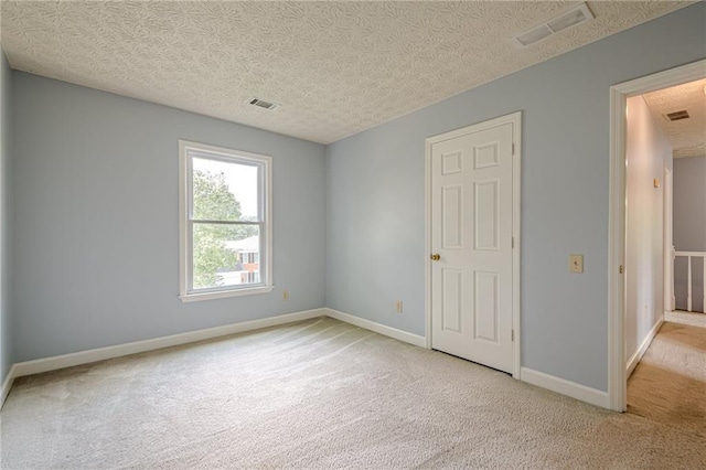 2794 Craig Ct, Marietta, GA 30062 - carpeted spare room featuring a textured ceiling and baseboards